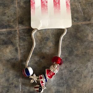 Silver bracelet with red and blue beads